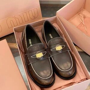 Miu Miu Dark Brown Leather Penny Loafers with Gold Accent